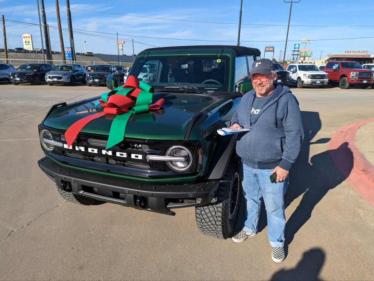 Had to do the Christmas bow on the car.