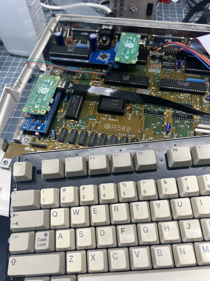 Amiga 500 with case open showing a pistorm and an rgb2hdmi
